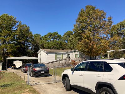 Concrete Driveway with fence | Image 3