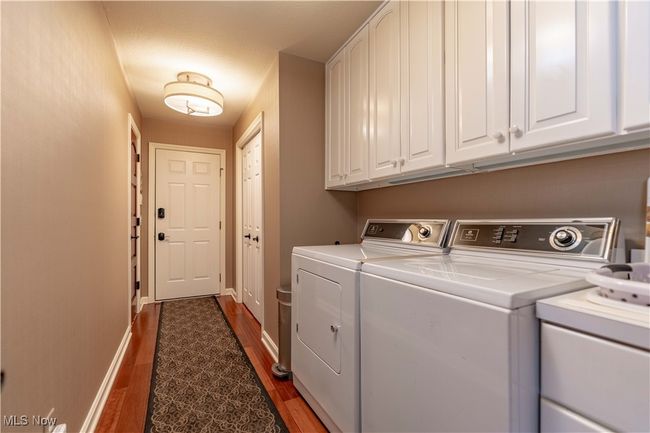 Here is a view of the laundry room. | Image 46