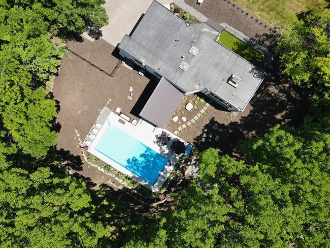 Fenced in pet turf area, could be covered to pavers | Image 33