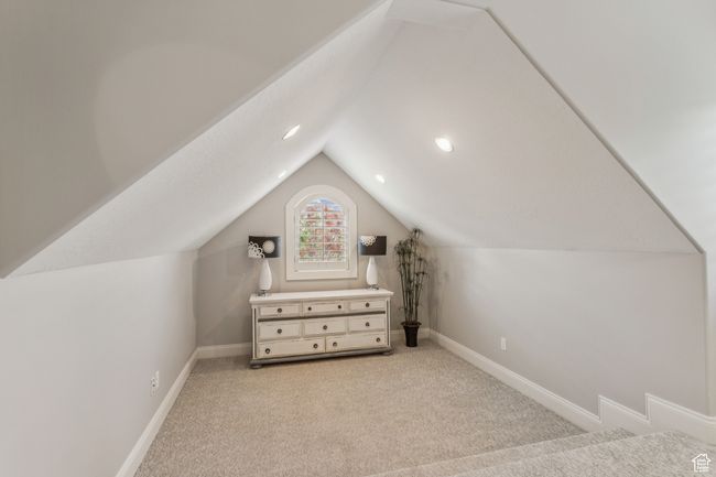 Additional living space with lofted ceiling, carpet, and recessed lighting | Image 46