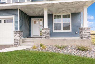 Photo is of the actual home. The front porch. | Image 2