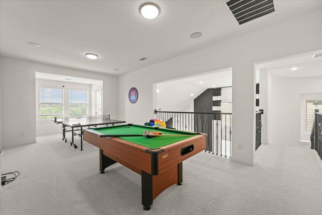 Game room with carpet flooring, pool table, and recessed lighting | Image 17