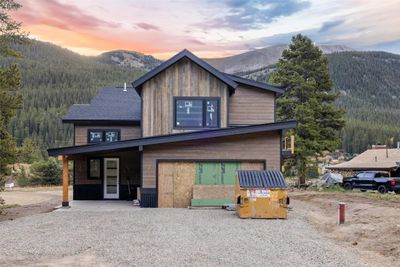 View of front of home with a mountain view and covered porch | Image 1