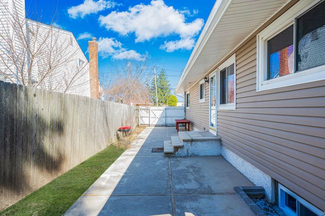 View of patio / terrace with an outbuilding and a fenced backyard | Image 23