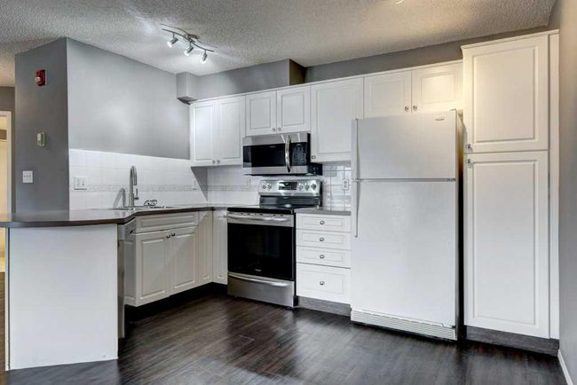 106 - 30 Sierra Morena Mews Sw, Condo with 2 bedrooms, 2 bathrooms and 1 parking in Calgary AB | Image 11