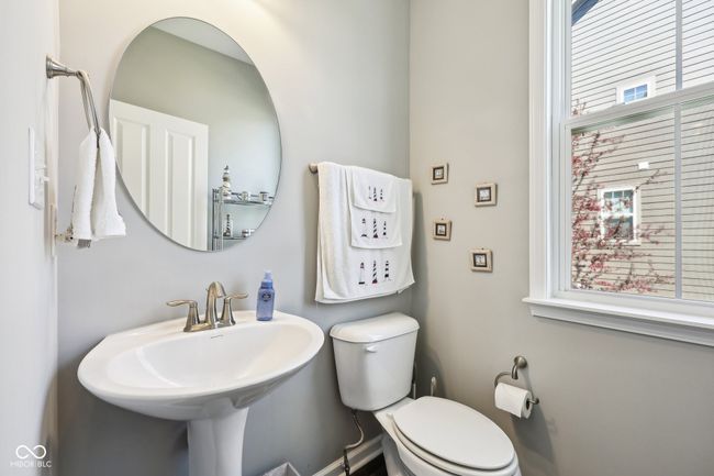 Main level powder room. | Image 28