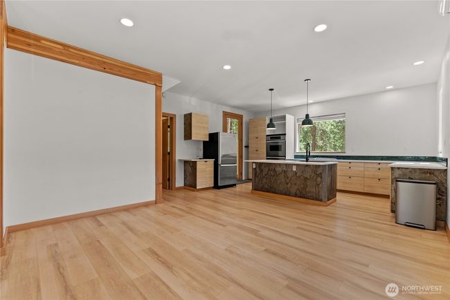 Living and dining room area. | Image 12