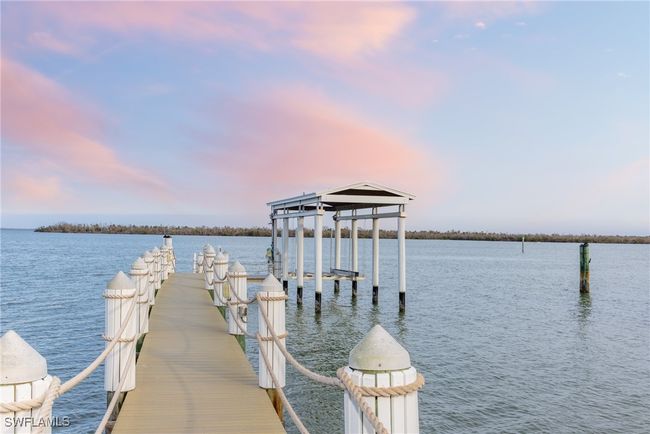 Dock with covered boat lift also has a floating kayak dock (not pictured) | Image 46