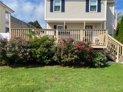 Fenced sun drench back yard perfect for entertaining. | Image 3