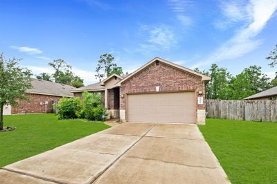 14021 Buffalo Gap Trail, House other with 4 bedrooms, 3 bathrooms and null parking in Conroe TX | Image 2