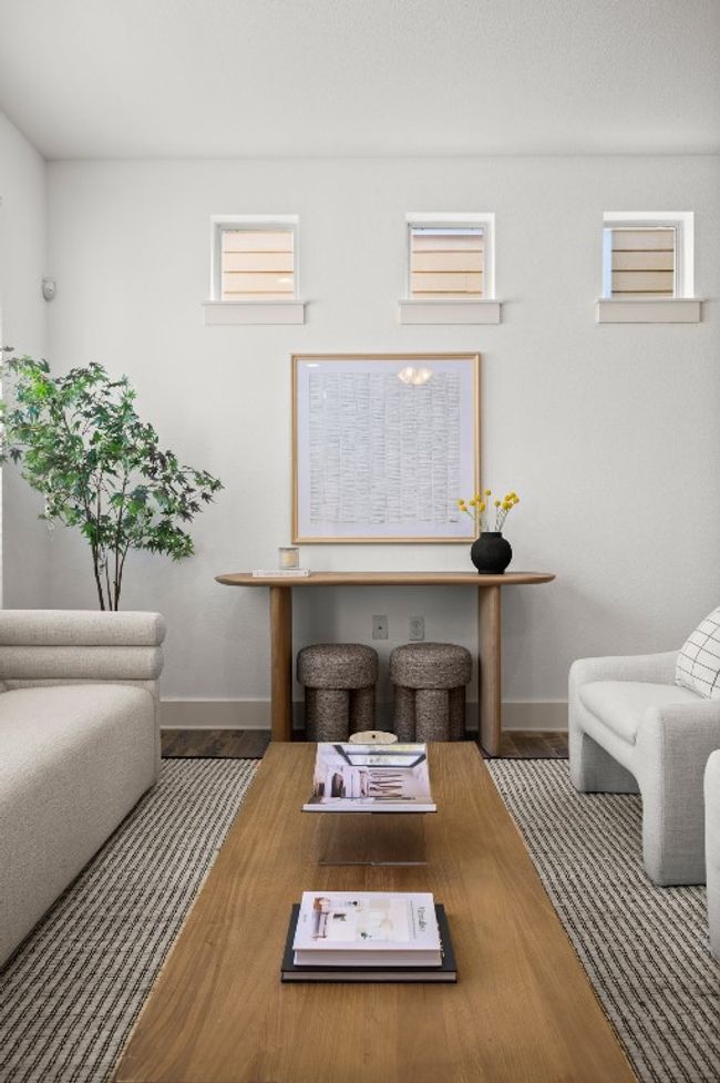 Living room with baseboards and wood finished floors | Image 22