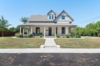 View of front with a front yard and a porch | Image 2