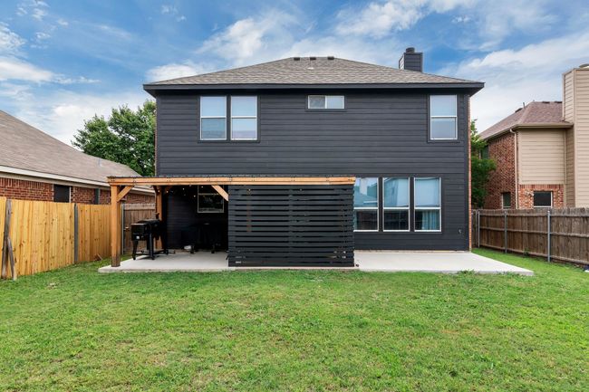 Back of property featuring a patio area and a chimney | Image 30