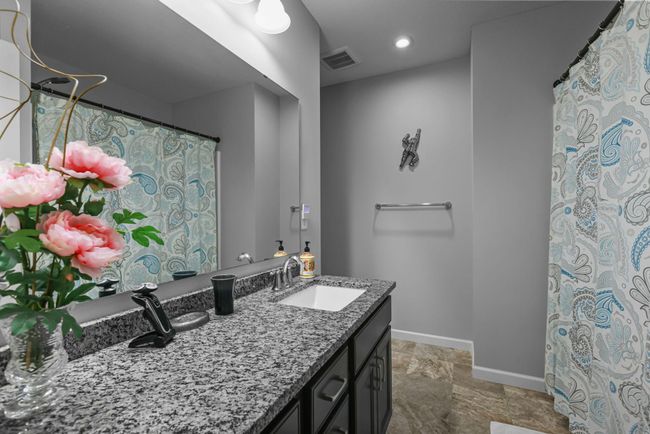 Main / Upstairs full bathroom features large granite counter vanity and full tub. | Image 29