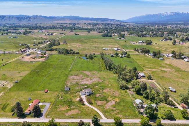 View of property location featuring rural landscape, mountains, and a pastoral area | Image 59