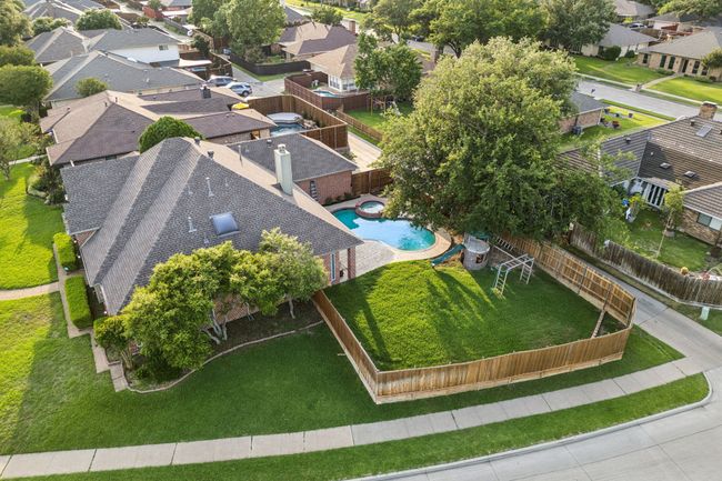 Aerial perspective of suburban area with a pool area | Image 37