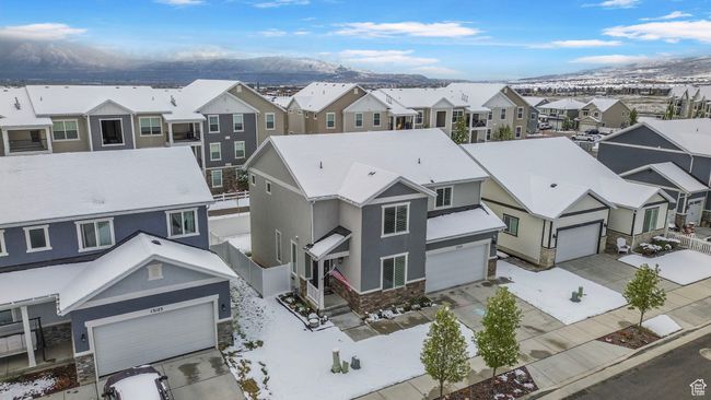 Snowy aerial view with a mountain view and a residential view | Image 31