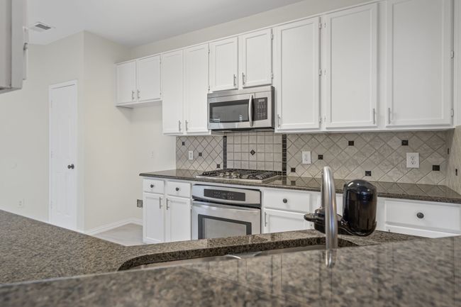 Lots of cabinet space plus a pantry | Image 8