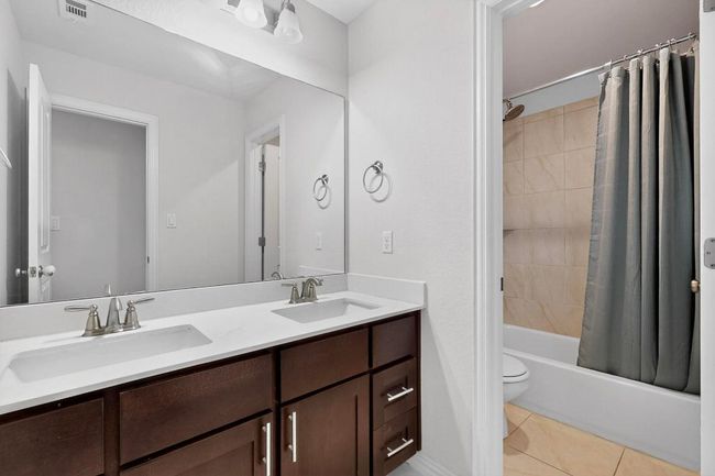 Carpeted spare room featuring baseboards | Image 19