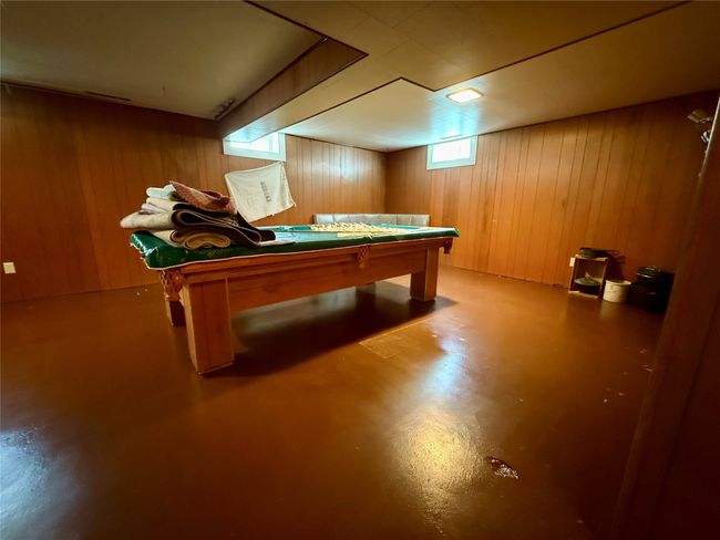 Basement living room with pool table | Image 30
