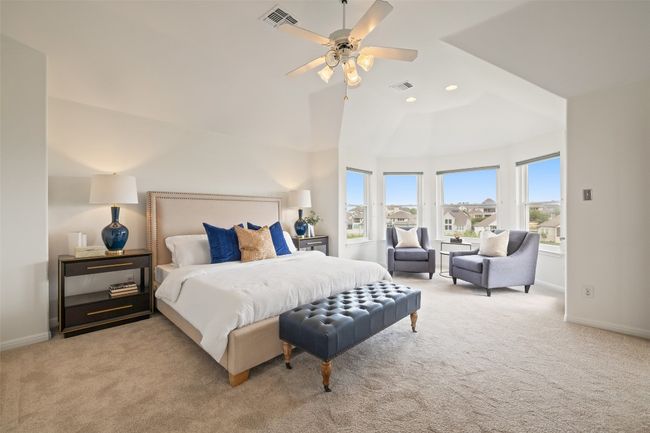 Bedroom featuring light colored carpet, a ceiling fan, recessed lighting, and vaulted ceiling | Image 24