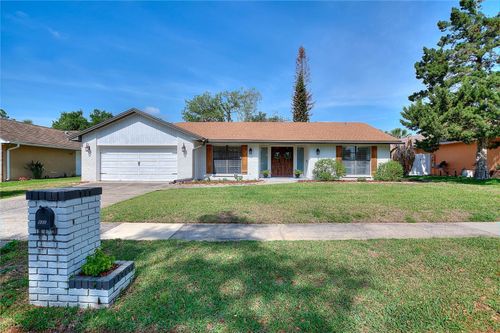 932 Yellow Rose Dr, ORLANDO, FL, 32818-6909 | Card Image