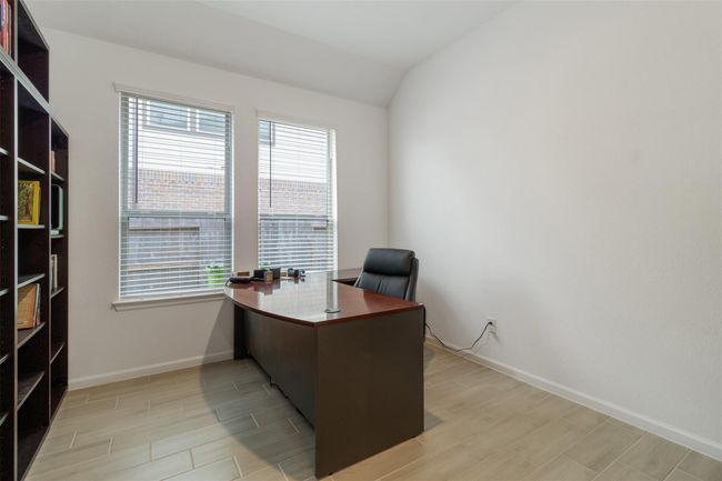 Your spacious home office is ready for you to work. | Image 10