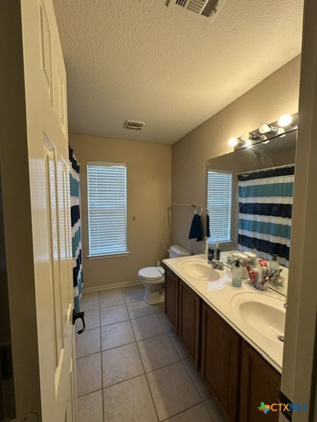 172 Coreopsis Cv, House other with 4 bedrooms, 3 bathrooms and null parking in Kyle TX | Image 15