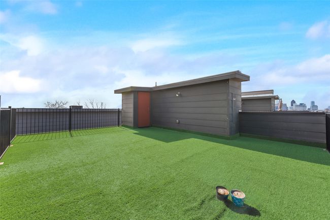 Rooftop patio/lounge/entertainment area with turf | Image 23
