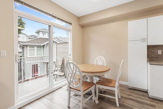 Dining room featuring baseboards and light wood-style floors | Image 15