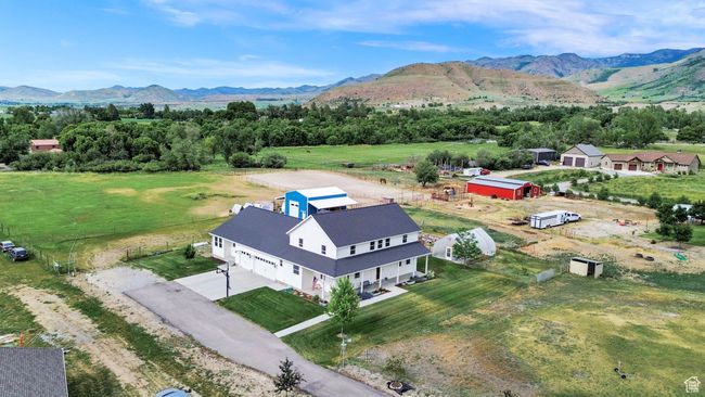 Overview of rural landscape with a mountain backdrop | Image 64