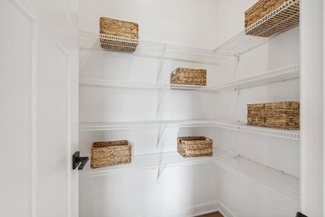 (Photo of a decorated model home, actual features may vary) A large walk-in pantry! | Image 6