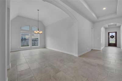 And a spacious formal dining with additional storage closet for family gatherings | Image 3