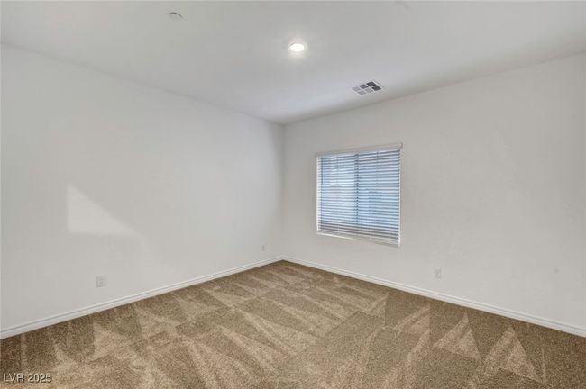 Spare room with carpet flooring, recessed lighting, visible vents, and baseboards | Image 30