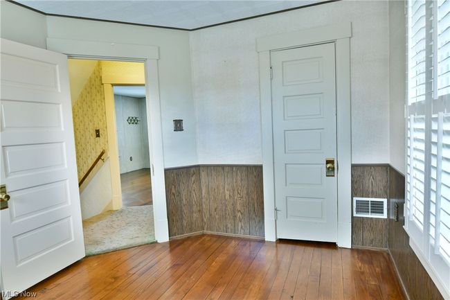 Empty room featuring dark wood-type flooring | Image 29
