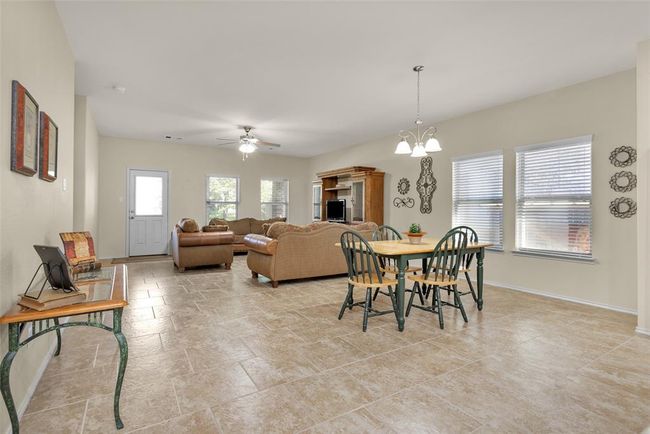 Breakfast & family room just off the kitchen. All tile flooring for easy care. | Image 15