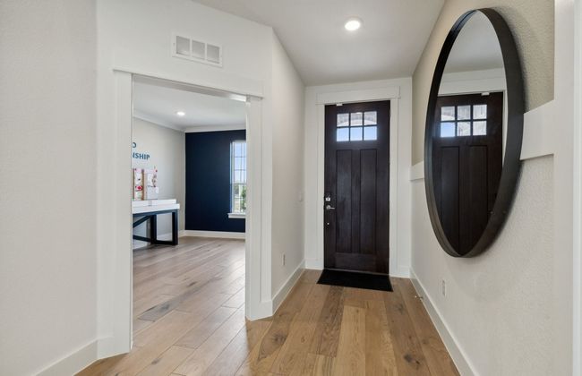Welcoming entry *Photos of furnished model. Not actual home. Representative of floor plan. Some options and features may vary | Image 8