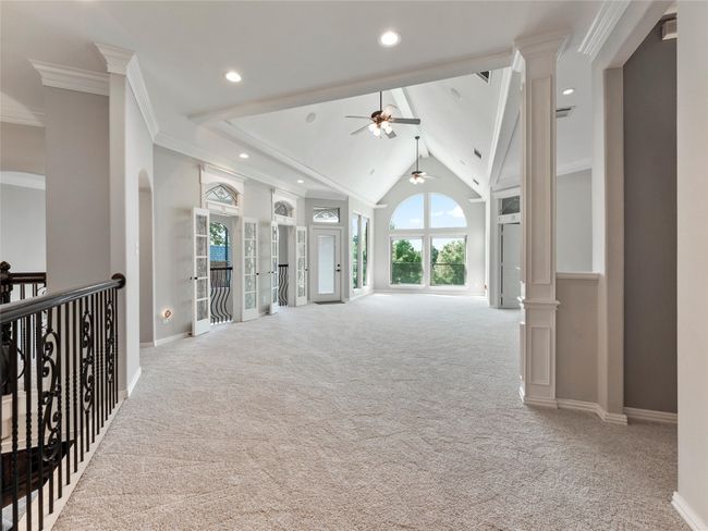 Hall featuring healthy amount of natural light, carpet, ornamental molding, recessed lighting, and ornate columns | Image 30
