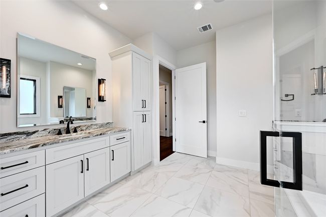 Bathroom with visible vents, marble finish floor, recessed lighting, baseboards, and vanity | Image 20