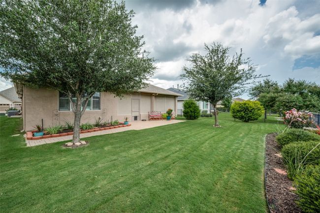 View of yard with a patio area | Image 12