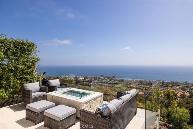 Firepit lounge area can also be enjoyed year-round on your private ocean-view patio. | Image 6