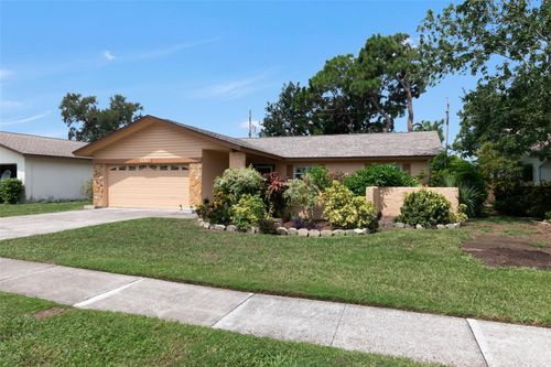 1150 Brook Dr W, DUNEDIN, FL, 34698-4644 | Card Image