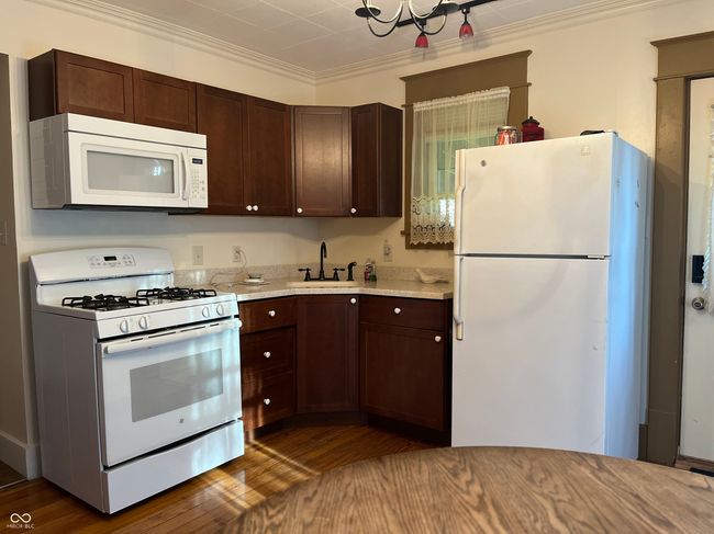 Kitchen located at back of home | Image 13