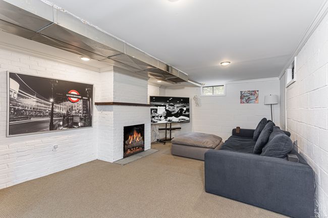 Basement with woodburning fireplace | Image 16