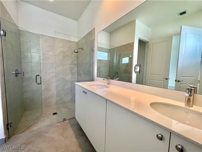 Bathroom with walk in shower and vanity | Image 20