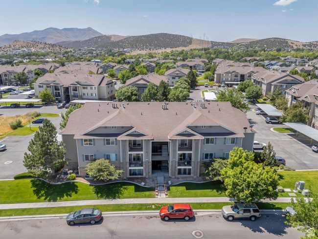 Aerial perspective of suburban area featuring a mountain backdrop | Image 15