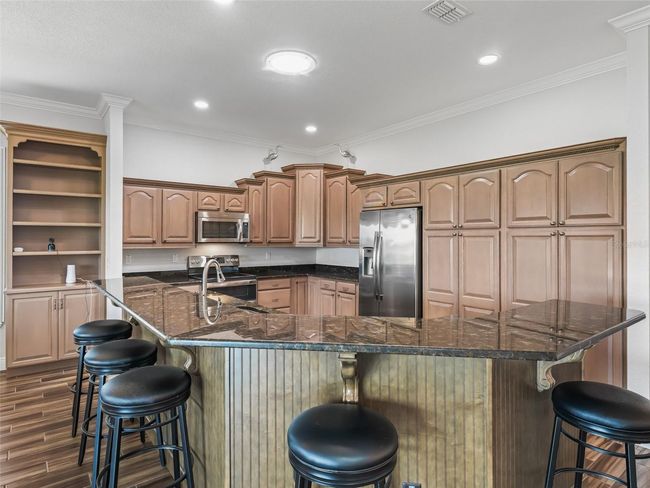 Staggard Wood Cabinets | Image 17