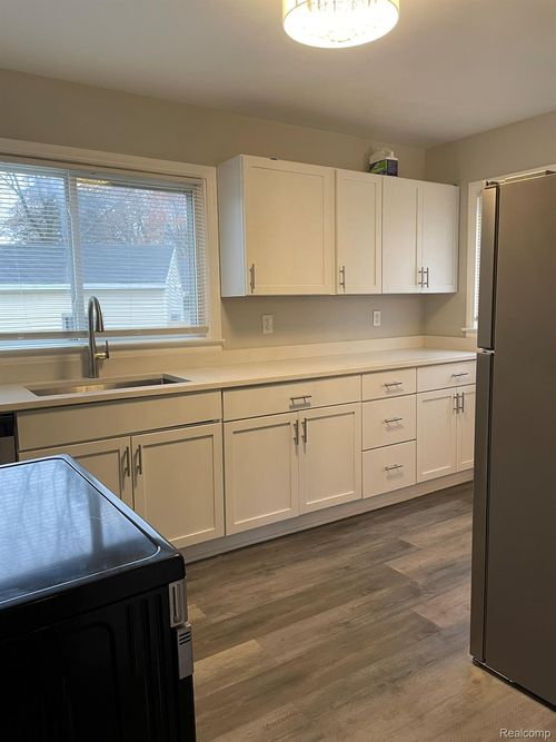 3021 N Grand River Ave, Lansing, MI, 48906-3869 | Card Image