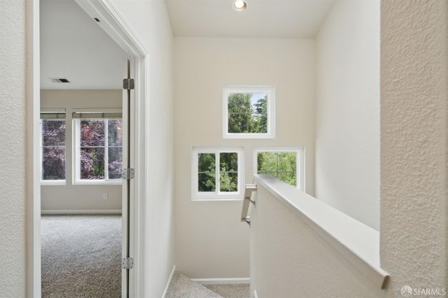 You'll love all the natural light in the stairwell | Image 37