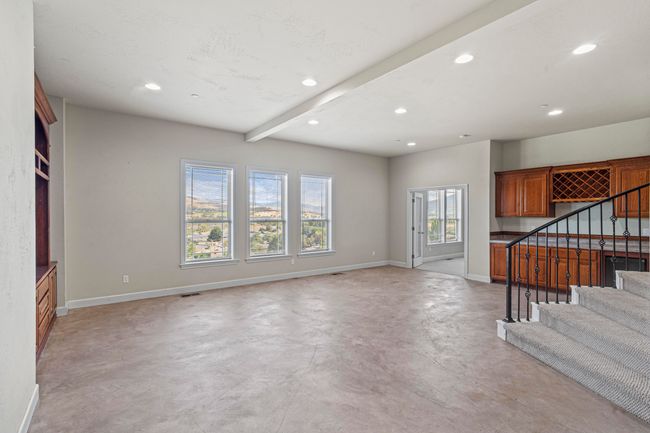 Downstairs family room with view | Image 36